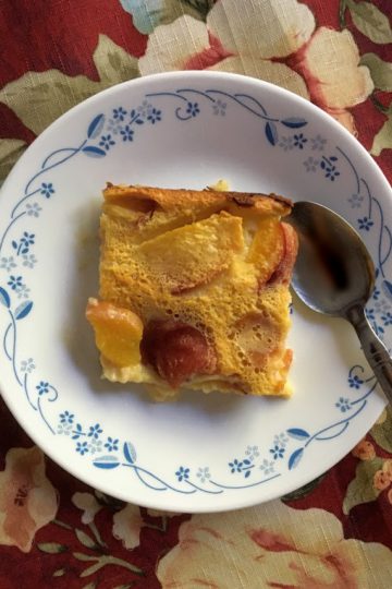 a piece of clafoutis served on a plate