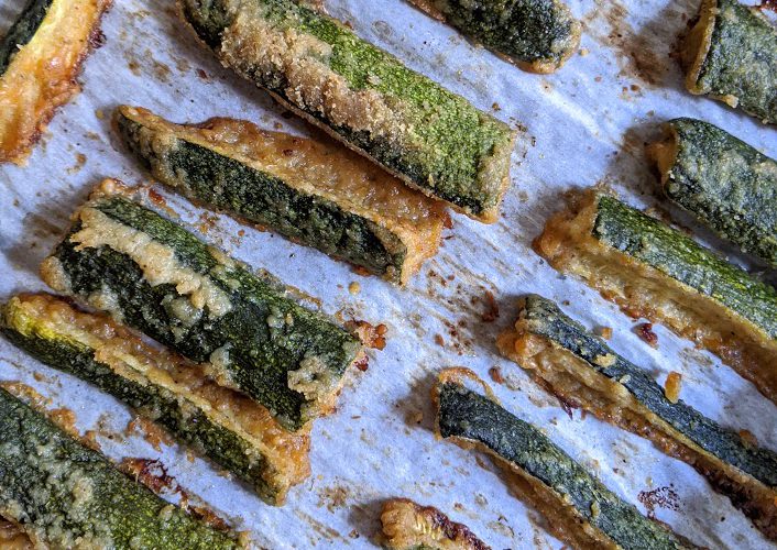 zucchini parmesan sticks on baking sheet