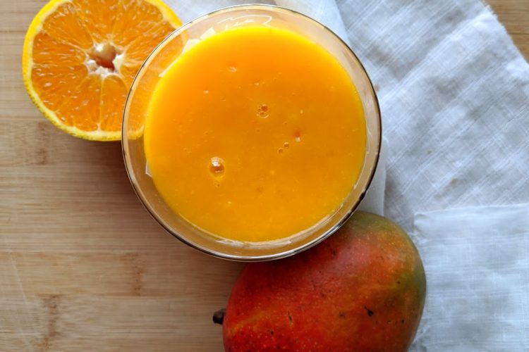 mango pineapple orange juice, seen from above