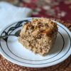 Baked Steel Cut Oats piece on plate with spoon