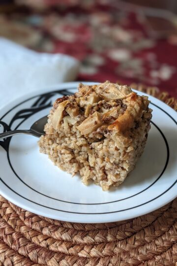 Baked Steel Cut Oats piece on plate with spoon