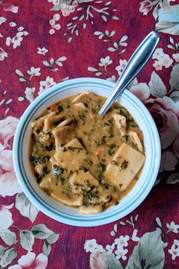 Dal Dhokli served in bowl on table