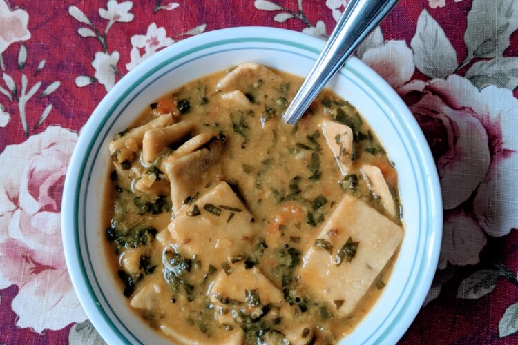 Dal Dhokli served in bowl on table