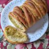 Rosemary Garlic Bread on plate with a slice