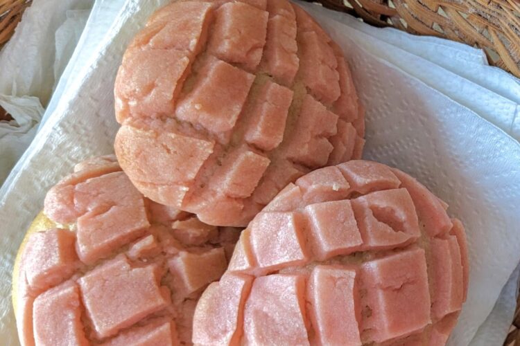 Rose Conchas in basket and on board, top view